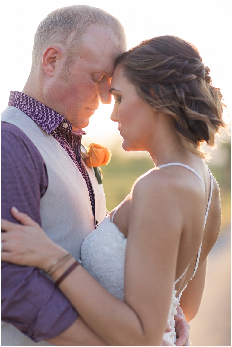 Lora & Zach's spring intimate wedding ceremony at a river overlook followed by their reception and sunset portraits at Rivercrest Farm and Events in the Shenandoah Valley in Virginia.