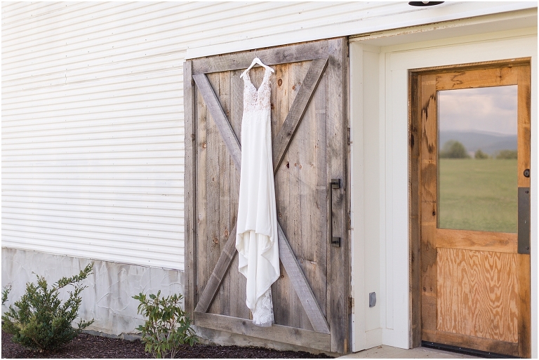 Baylee & Josh's August wedding at Skyridge Farm's rustic barn with a summer storm and sunset portraits in the Shenandoah Valley, Virginia.