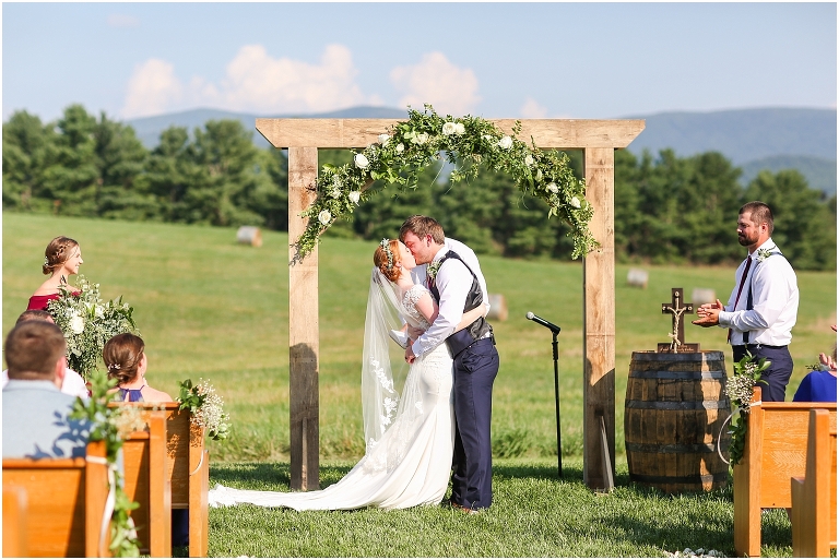 Baylee & Josh's August wedding at Skyridge Farm's rustic barn with a summer storm and sunset portraits in the Shenandoah Valley, Virginia.