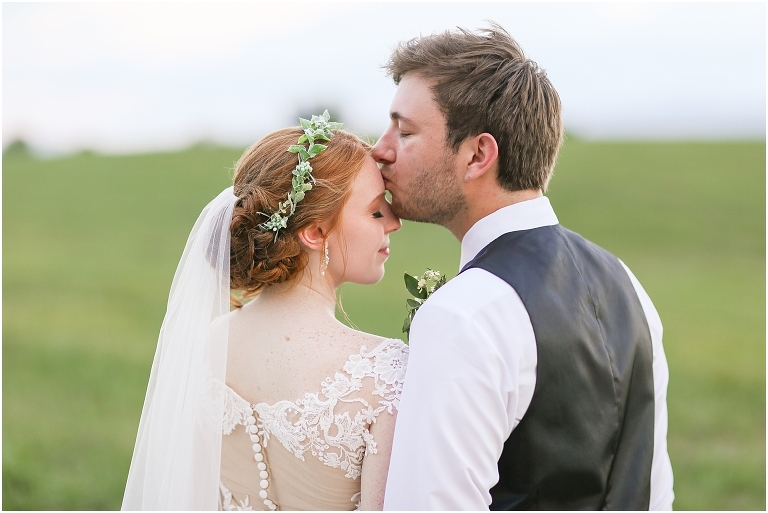Baylee & Josh's August wedding at Skyridge Farm's rustic barn with a summer storm and sunset portraits in the Shenandoah Valley, Virginia.