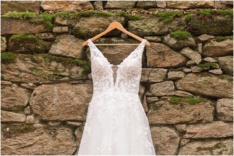 Emma & Dan's The Mill at Fine Creek Richmond autumn wedding with a riverside first look, ceremony in the garden surrounded by fall foliage, and portraits in the fairy light lit abandoned mill at dusk. This is a wedding dress photo in the abandoned mill