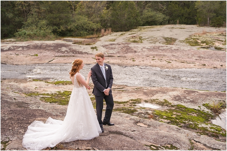 Emma & Dan's The Mill at Fine Creek Richmond autumn wedding with a riverside first look, ceremony in the garden surrounded by fall foliage, and portraits in the fairy light lit abandoned mill at dusk.