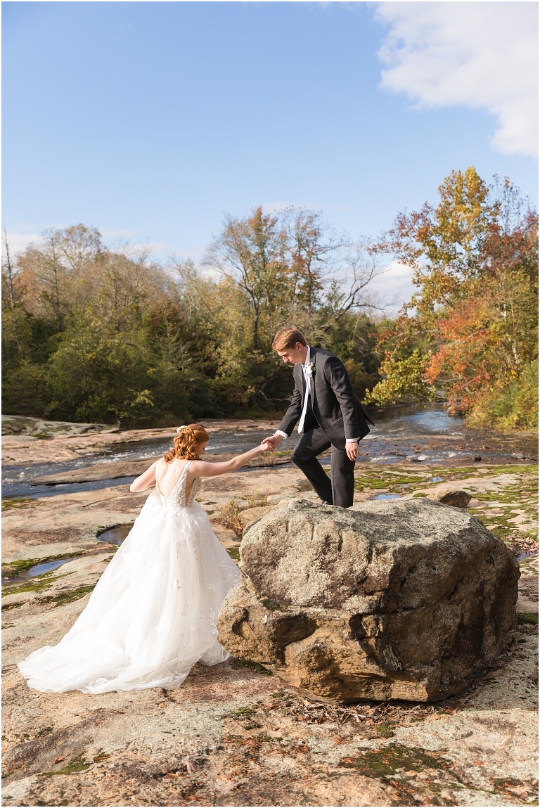 Emma & Dan's The Mill at Fine Creek Richmond autumn wedding with a riverside first look, ceremony in the garden surrounded by fall foliage, and portraits in the fairy light lit abandoned mill at dusk.