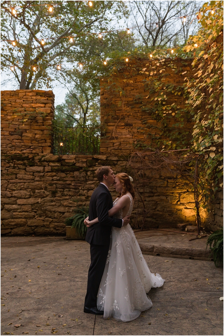 Emma & Dan's The Mill at Fine Creek Richmond autumn wedding with a riverside first look, ceremony in the garden surrounded by fall foliage, and portraits in the fairy light lit abandoned mill at dusk.