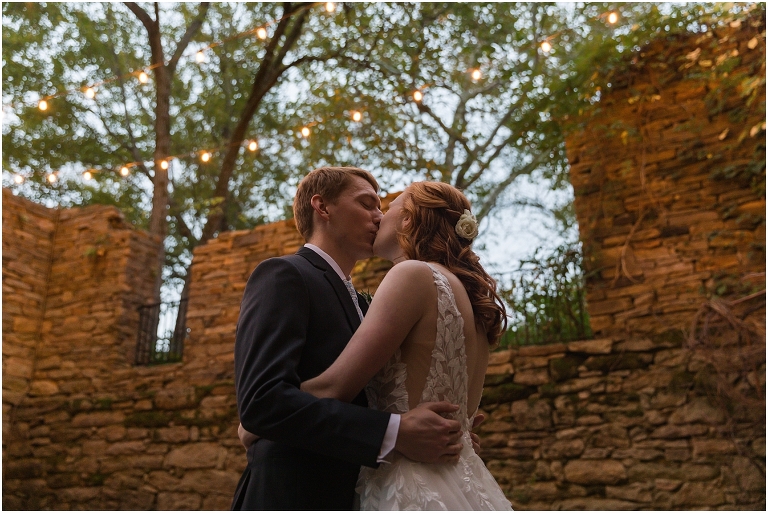 Emma & Dan's The Mill at Fine Creek Richmond autumn wedding with a riverside first look, ceremony in the garden surrounded by fall foliage, and portraits in the fairy light lit abandoned mill at dusk.