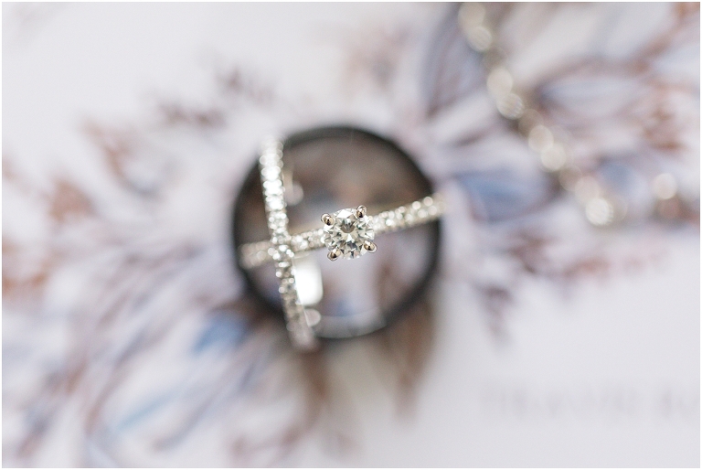 Abby & Travis's rainy wedding at Red August Farm in the Shenandoah Valley, Virginia with clear umbrella wedding portraits and a sparkler exit. Close up ring shot
