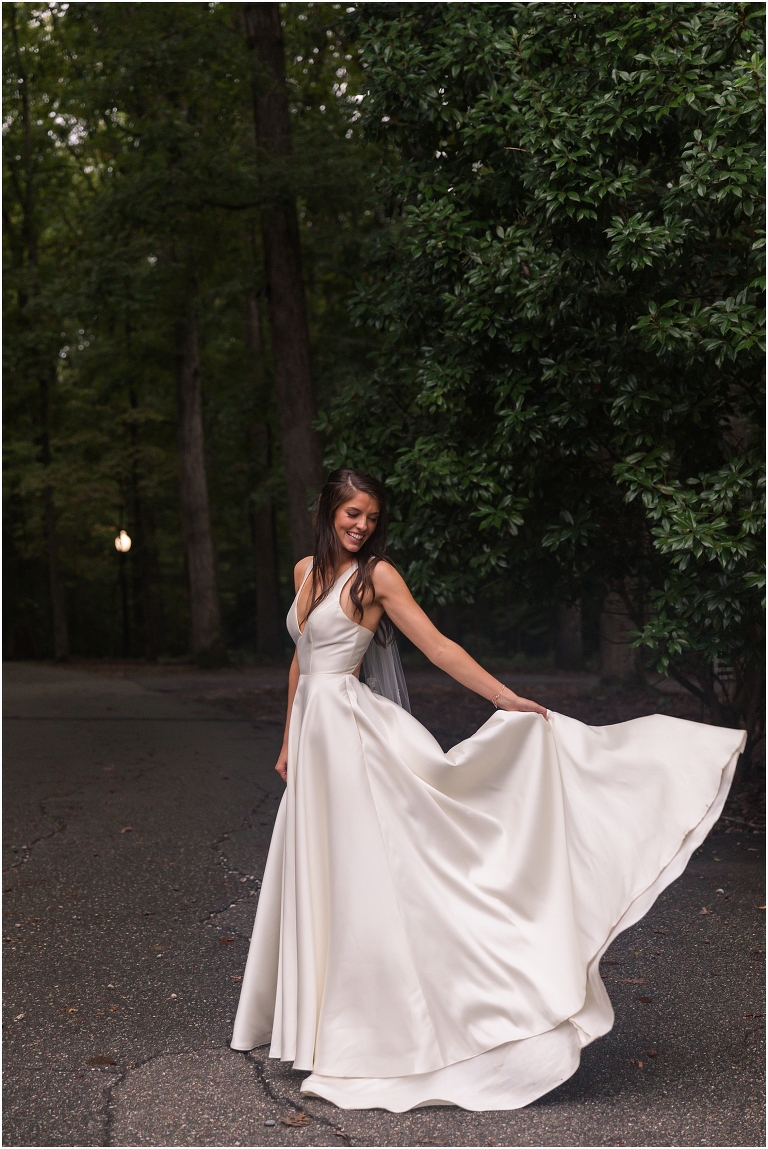 Allie & Cam's autumn riverside Richmond wedding at Celebrations at the Reservoir with a first dance under the lights, forest newlywed portraits, a dessert table, and a signature drink named after their dog.