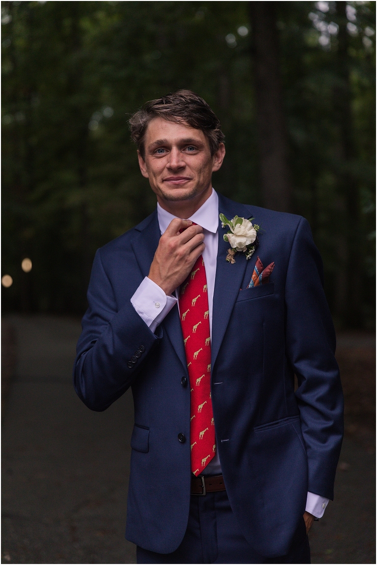 Allie & Cam's autumn riverside Richmond wedding at Celebrations at the Reservoir with a first dance under the lights, forest newlywed portraits, a dessert table, and a signature drink named after their dog.