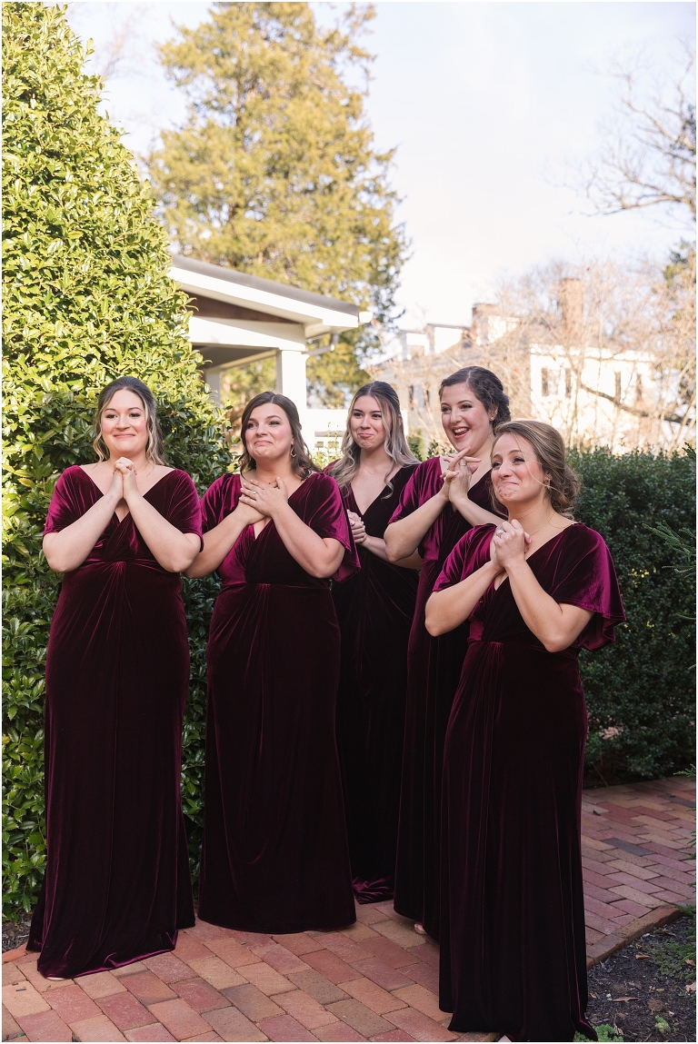 Rachael & Trent's red velvet and white winter wedding at the Inn at Willow Grove with a first look with bridesmaids, first look and letter reading, ceremony in the hidden garden, sunset mountain newlywed portraits, and a fairy light tent reception.