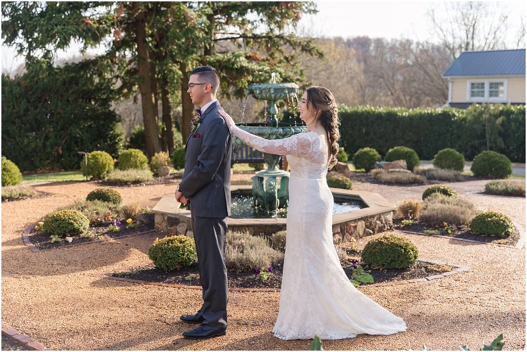 Rachael & Trent's red velvet and white winter wedding at the Inn at Willow Grove with a first look with bridesmaids, first look and letter reading, ceremony in the hidden garden, sunset mountain newlywed portraits, and a fairy light tent reception.