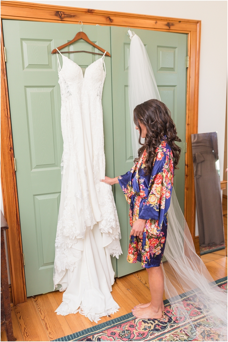 Family farm and barn spring wedding bride with her wedding dress getting ready