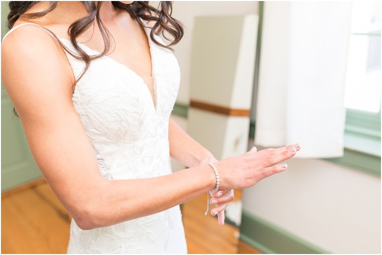 Family farm and barn spring wedding bride with her wedding dress getting ready
