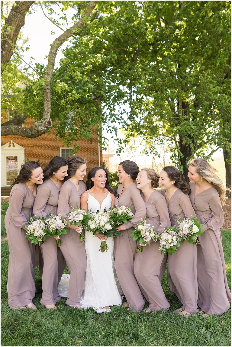 Family farm and barn spring wedding bridesmaid portraits with mauve bridesmaid dresses