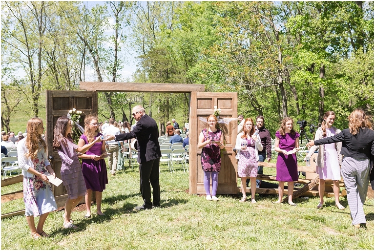 Family farm and barn spring wedding ceremony