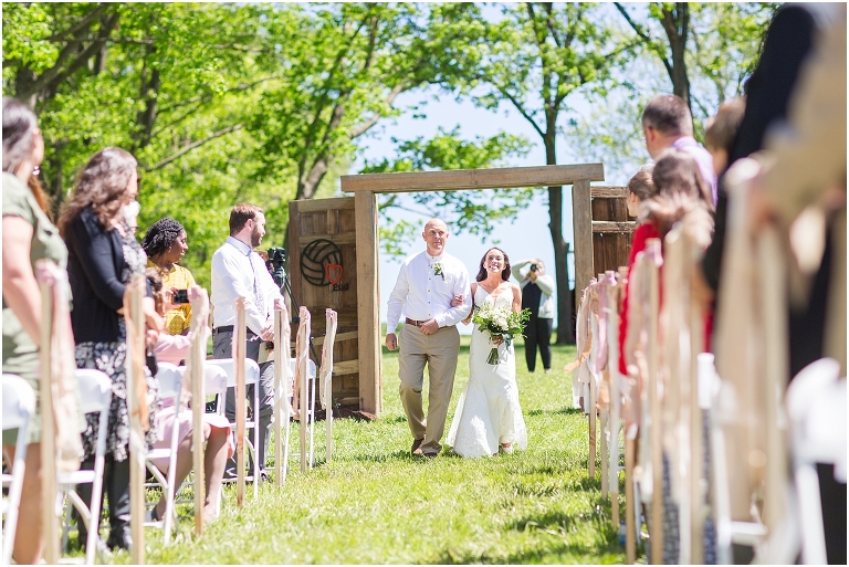 Family farm and barn spring wedding ceremony