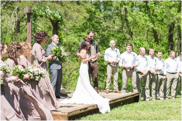 Family farm and barn spring wedding ceremony