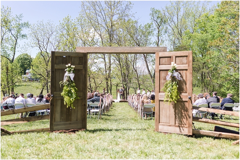 Family farm and barn spring wedding ceremony