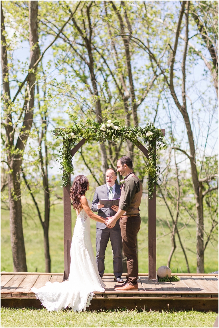 Family farm and barn spring wedding ceremony