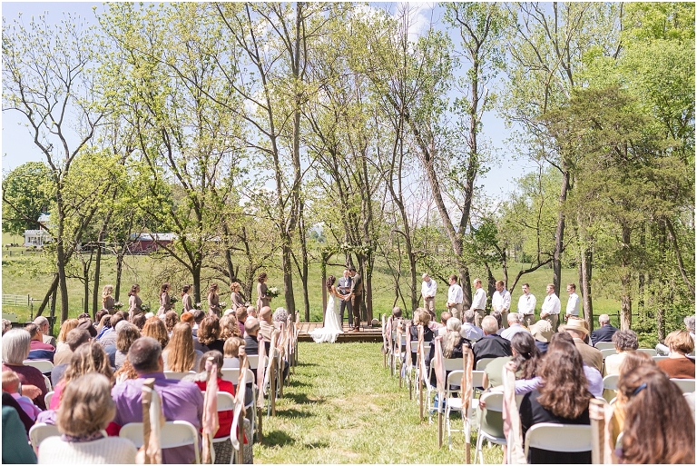 Family farm and barn spring wedding ceremony