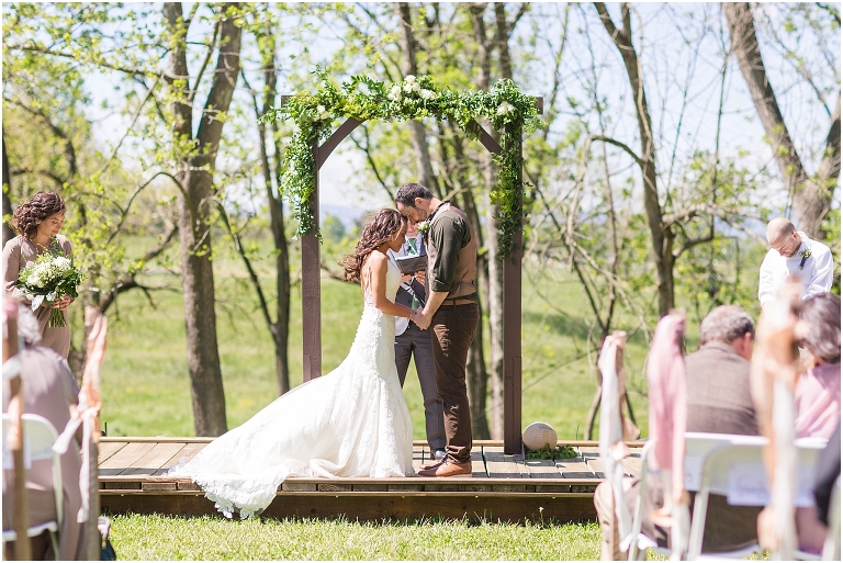 Family farm and barn spring wedding ceremony