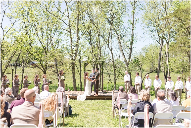 Family farm and barn spring wedding ceremony