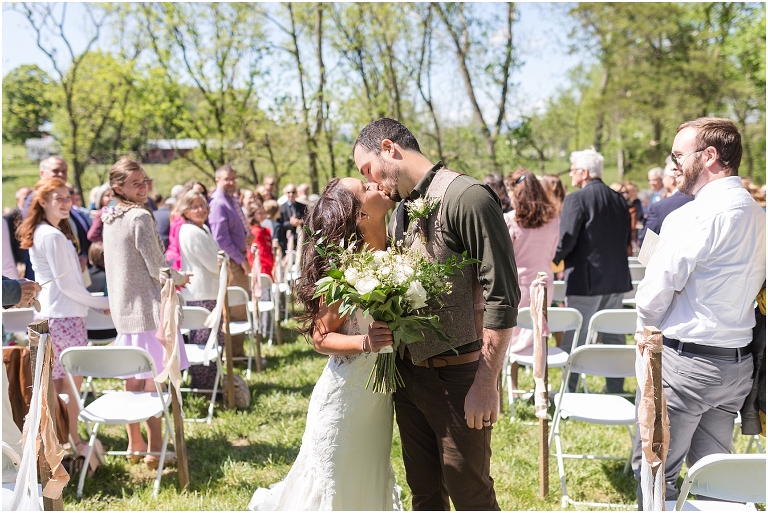 Family farm and barn spring wedding ceremony