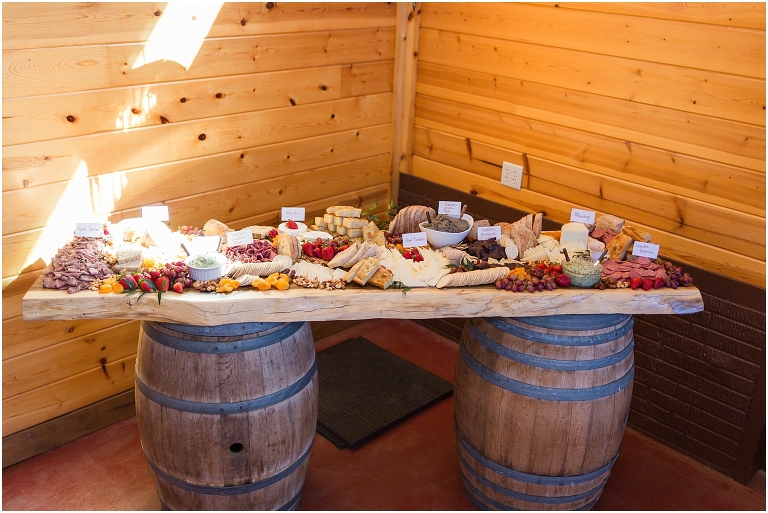 Family farm and barn spring wedding reception details charcuterie board