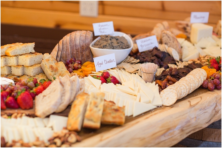 Family farm and barn spring wedding reception details charcuterie board