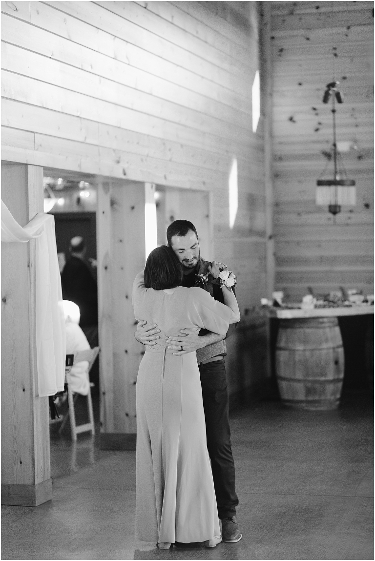 Family farm and barn spring wedding reception mother son dance