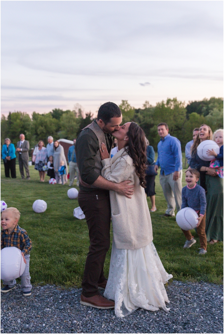 Family farm and barn spring wedding sunset exit
