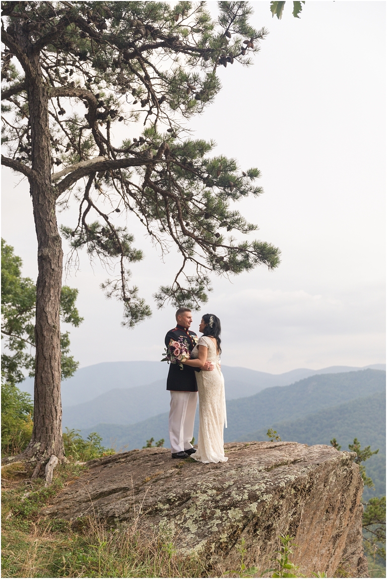 Newlywed portraits at a Blue Ridge Parkway mountain view sunset overlook after their Virginia elopement