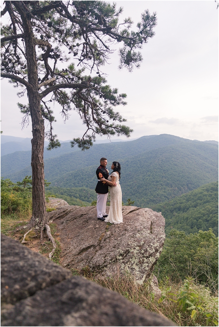 Newlywed portraits at a Blue Ridge Parkway mountain view sunset overlook after their Virginia elopement