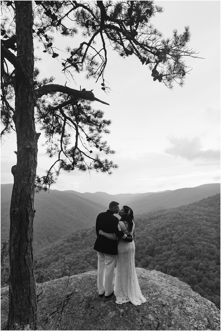 Newlywed portraits at a Blue Ridge Parkway mountain view sunset overlook after their Virginia elopement