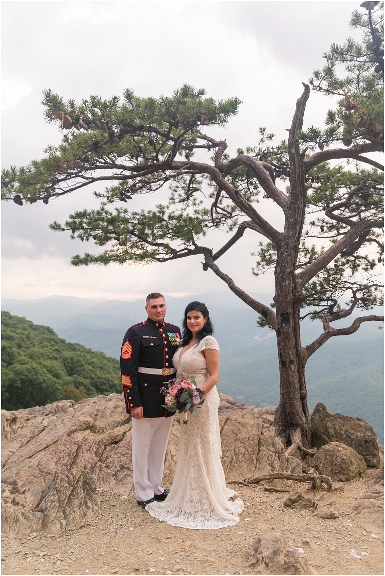 Newlywed portraits at a Blue Ridge Parkway mountain view sunset overlook after their Virginia elopement