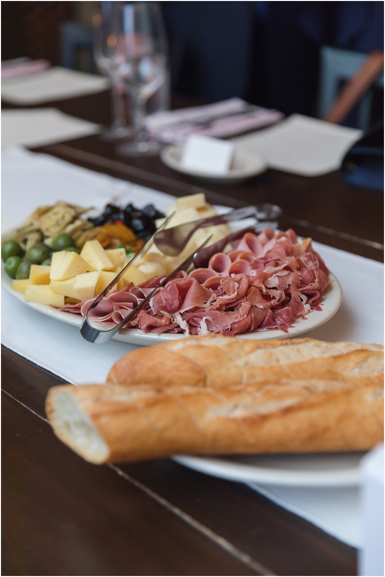 The charcuterie board appetizers from the restaurant after their elopement